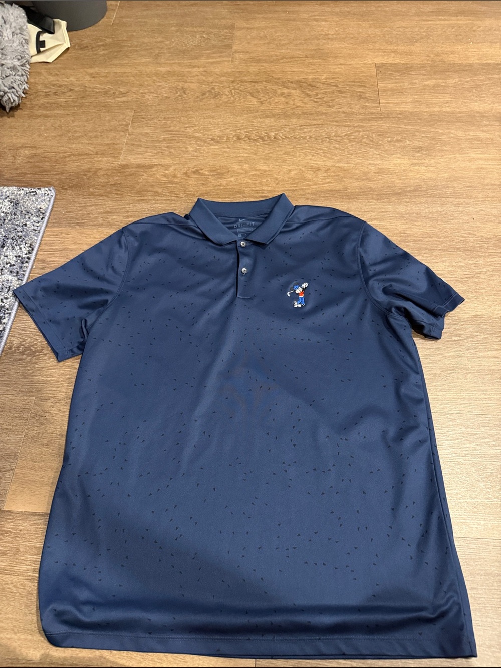 Walt Disney World Nike Men's Navy Polo with Embroidered Mickey